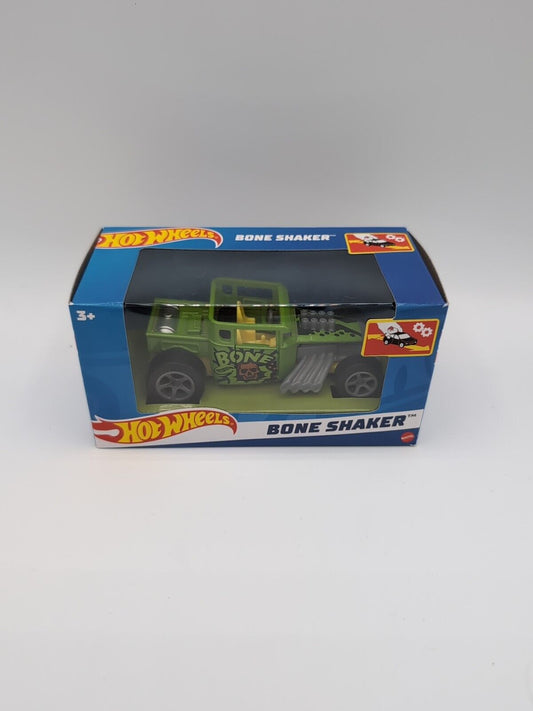 "Hot Wheels Pull-Back Speeder Green Bone Shaker in neon green, featuring iconic skull grille and 1:43 scale design.
