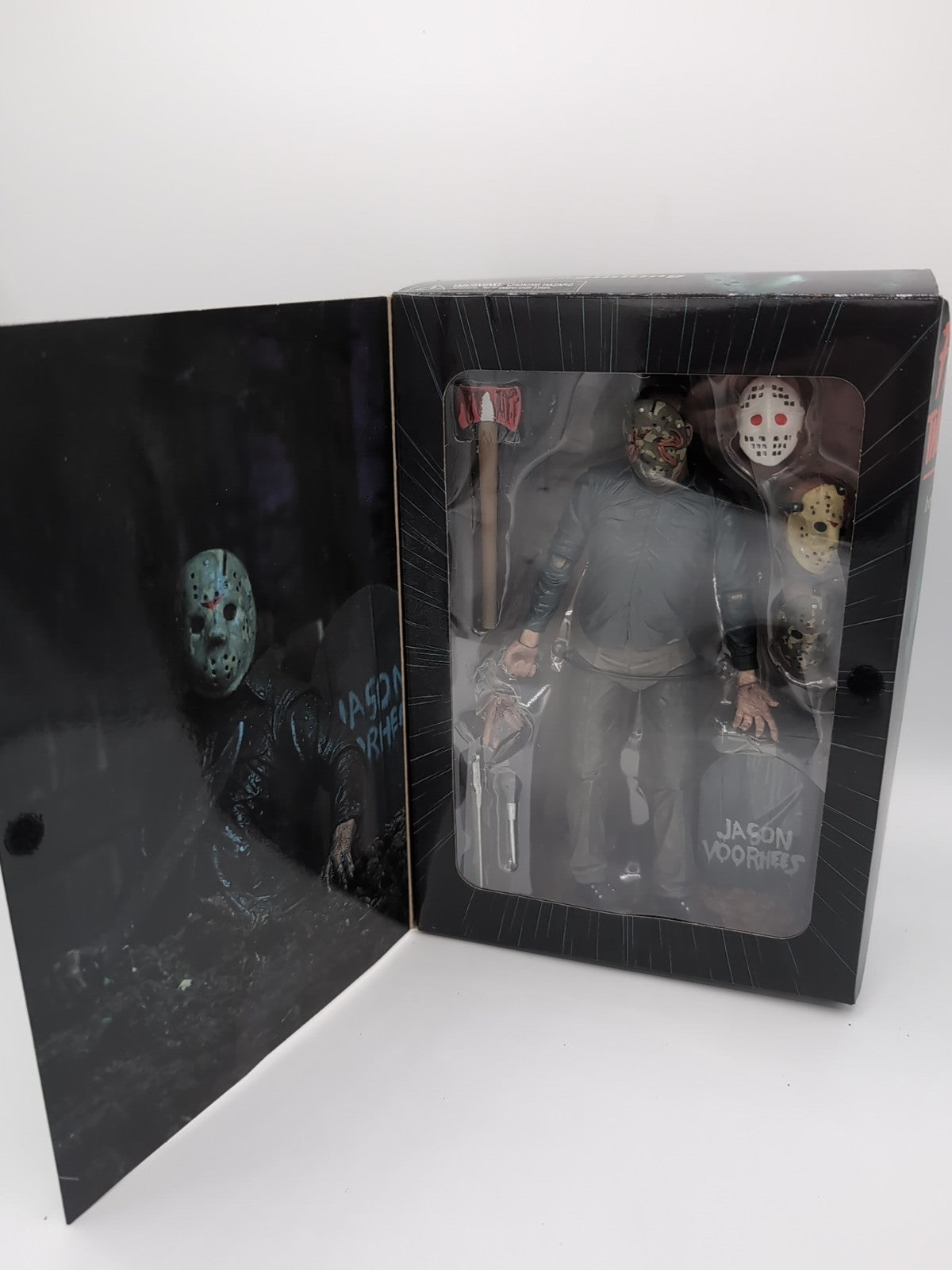 NECA Friday the 13th Part 5 Roy Burns Ultimate Jason 18cm Action Figure with interchangeable heads, machete, and pitchfork – highly detailed horror collectible