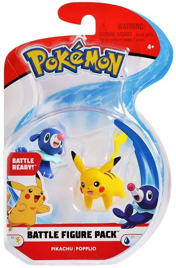 Packaged Pokemon Pikachu and Popplio battle action figures from the Pokemon franchise. The figures are visible through a clear plastic window on a red and blue card with Pokemon branding.