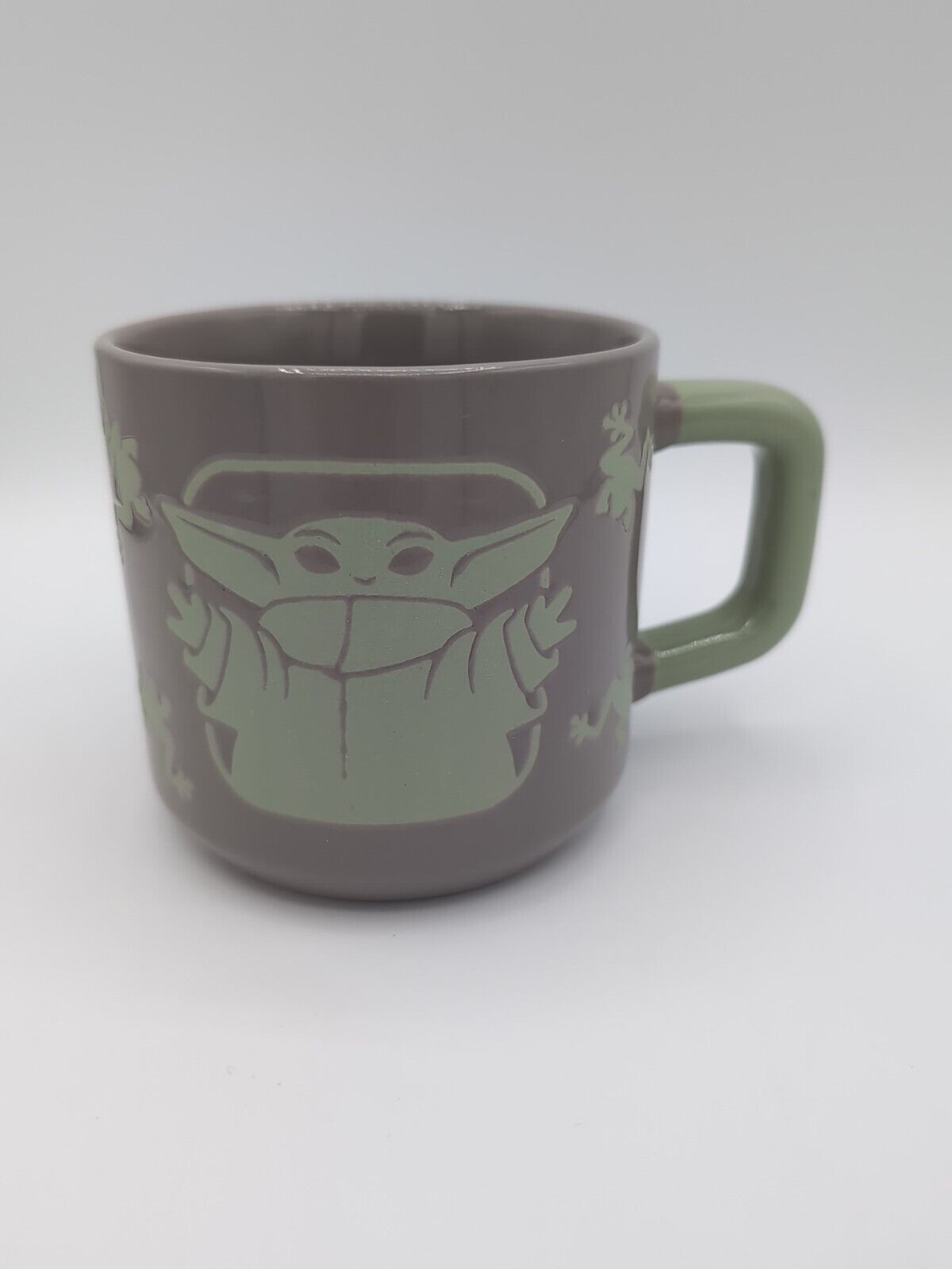 Close-up of Grogu design on 'The Force Works in Mysterious Ways' 15 oz Star Wars coffee mug