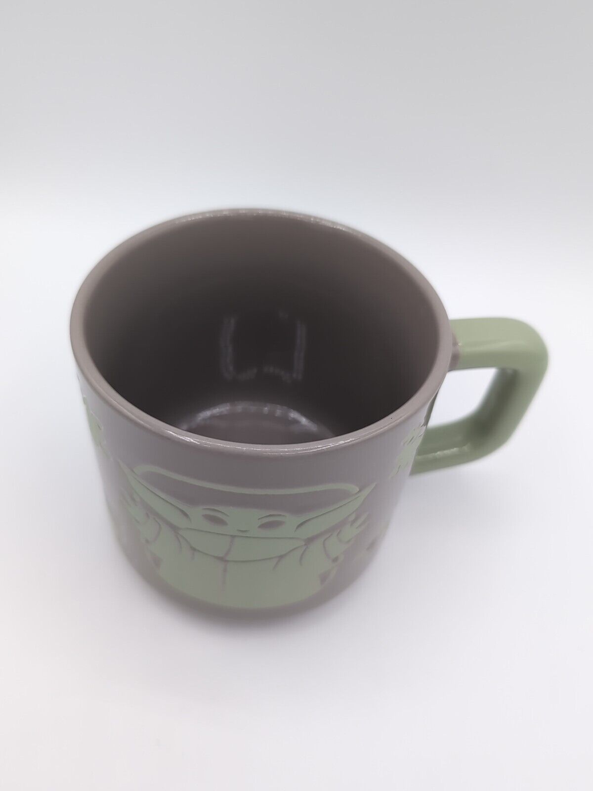 5 oz ceramic coffee mug featuring Grogu from The Mandalorian with 'The Force Works in Mysterious Ways' inscription