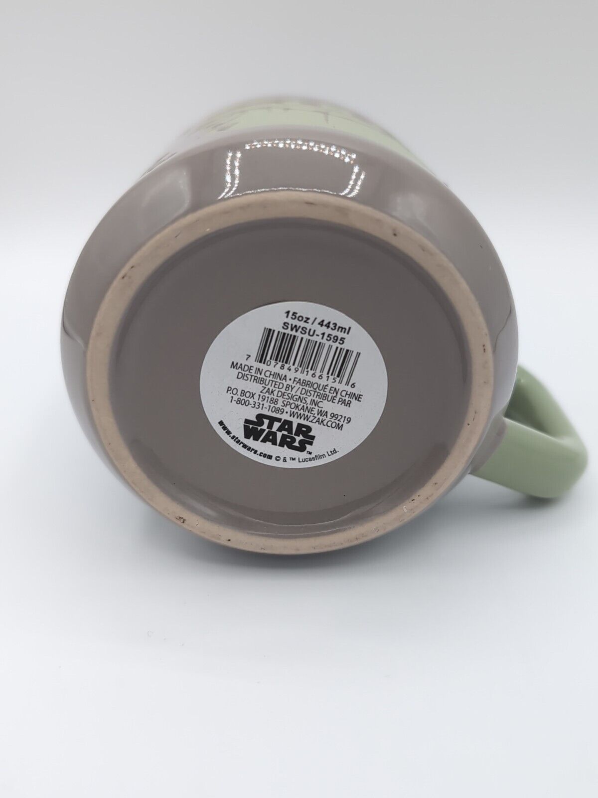 5 oz ceramic coffee mug featuring Grogu from The Mandalorian with 'The Force Works in Mysterious Ways' inscription